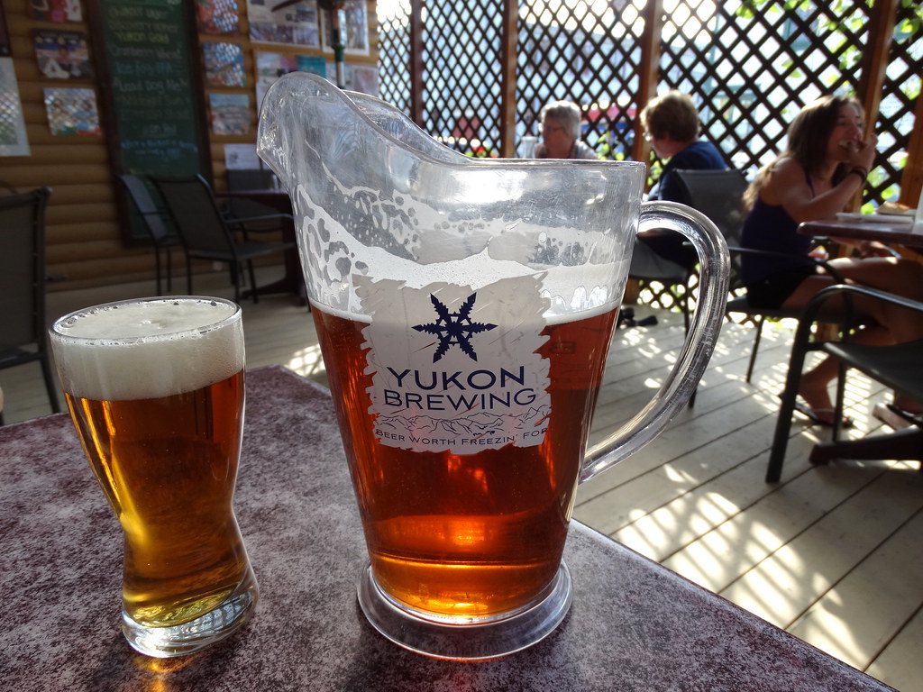 Pitcher and Glass of Yukon Gold Beer - Klondike Kate's - Dawson City - Yukon Territory - Canada